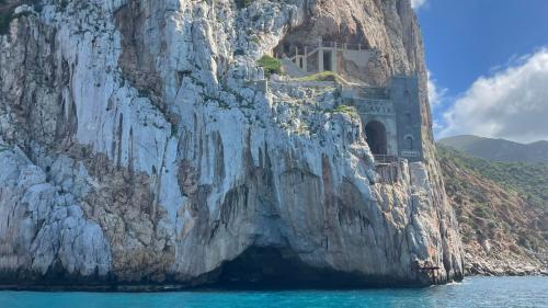 Stopping at Porto Flavia during the dinghy rental from Calasetta