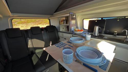 Table and kitchenette inside the motorhome