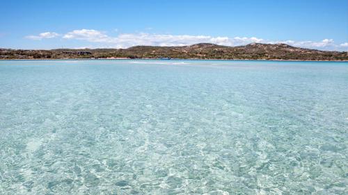 Crystal clear sea between Piana island and Piantarella beach in southern Corsica