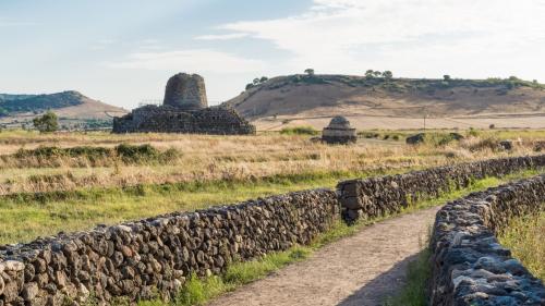 Rural landscape with nuraghe Santu Antine in the background in Torralba