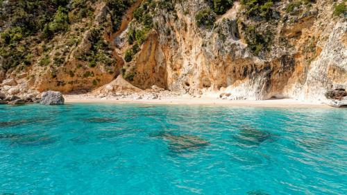 View from dinghy on Cala Sisine beach in the Gulf of Orosei