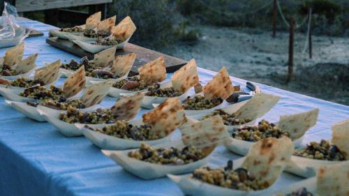 Fregula aux fruits de mer servie lors d'une dégustation de vins à Castelsardo