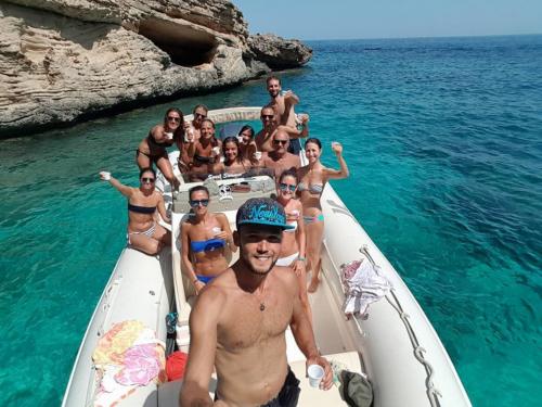 Group of hikers aboard an inflatable boat