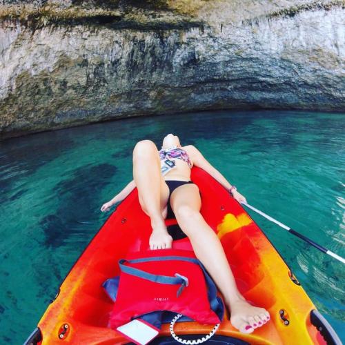 Girl relaxes in a kayak