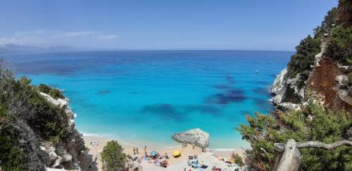panoramic view of the crystal clear turquoise waters of cala Goloritzè in the Gulf of Orosei
