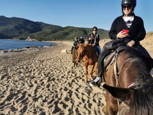 Girls on horseback during excursion