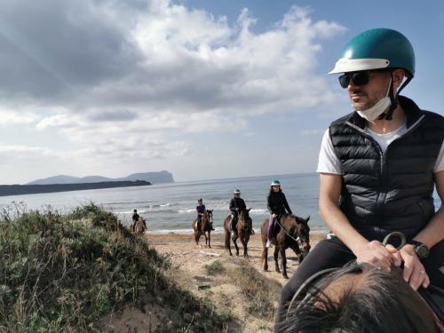 Group of hikers during horseback excursion