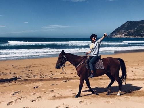 Girl during a guided horseback excursion to Lake Baratz