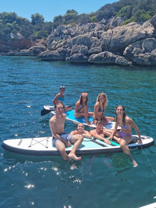 friends on SUP in the Gulf of Alghero