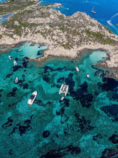Catamaran between the white beaches and the islands