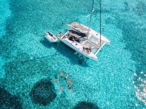 Passengers have fun aboard a catamaran