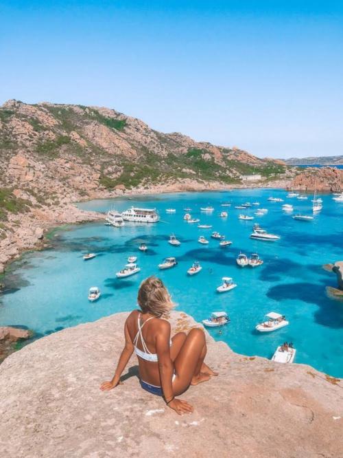 Girl and boats in the La Maddalena Archipel