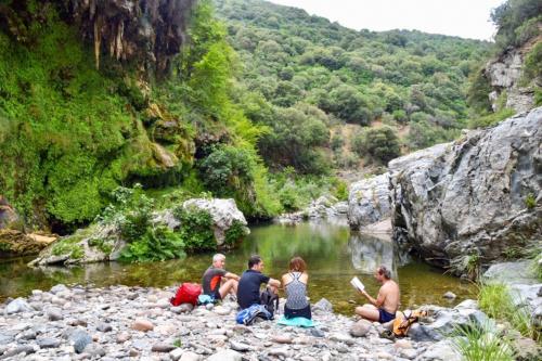 People at the waterfalls of sa stiddiosa during a moment of relaxation