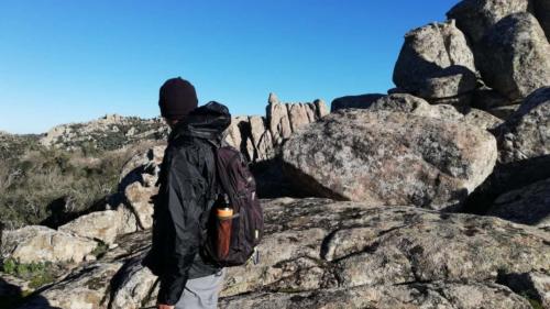 Hiker walks on the summit of the Seven Brothers