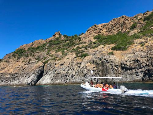 Dinghy and coast of Bosa