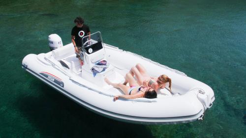 Girls relaxing on the rubber boat