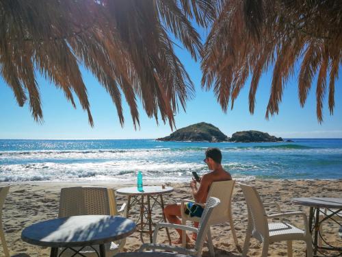 Relaxing on the beach in the Chia area