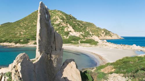 White sand and blue sea in the Villasimius area during guided beach tours