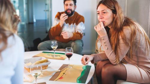 Workshop participants taste wine and cheese