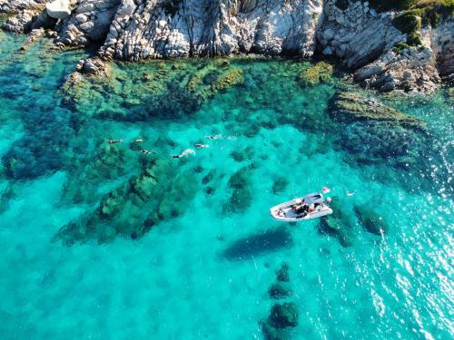 dinghy to the Molara pools with crystal-clear water