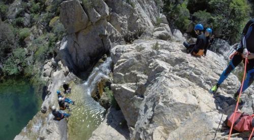 Hikers in Rio Pitrisconi during canyoning experience
