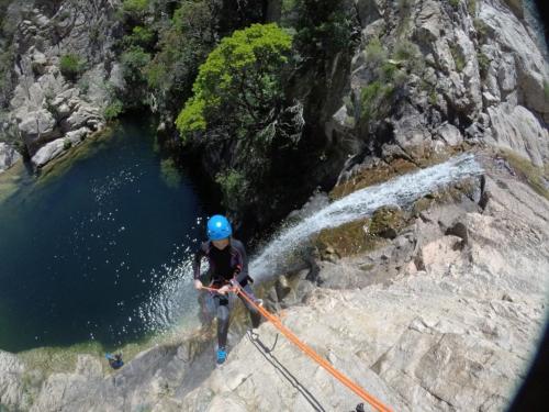 Girl goes up a waterfall