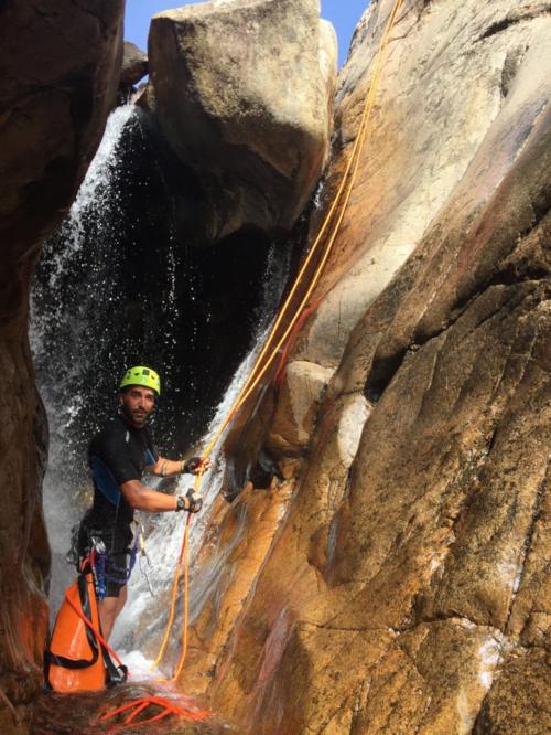 Boy with canyoning equipment