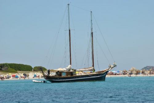 Vintage schooner on the coast of Villasimius