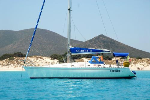 Sailboat in the crystal clear sea