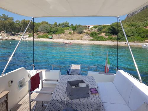 Boat with tent and comfortable seats