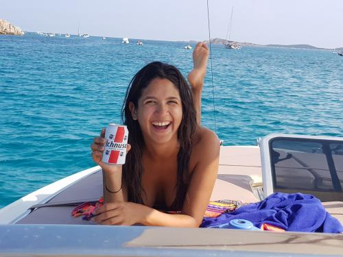 Girl on board a boat in Tavolara