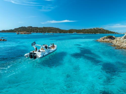 Inflatable boat in the crystal clear waters