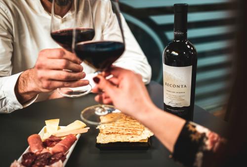 <p>Glasses of red wine served during tasting in a winery in Alghero</p>