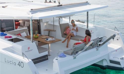Passengers relax aboard a luxury catamaran