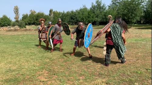 Demonstrators confront each other during a historical reconstruction