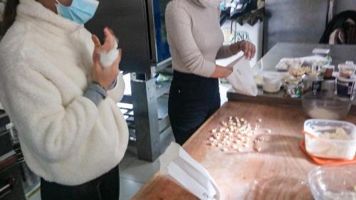 Sardinian women preparing typical Sardinian cookies