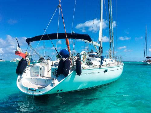 Sailboat in the crystal clear sea