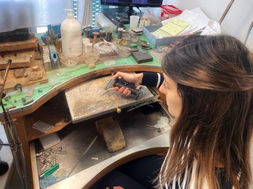 apprentice learns silver work to create jewellery