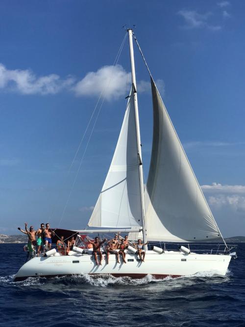 Passengers on board a sailing boat