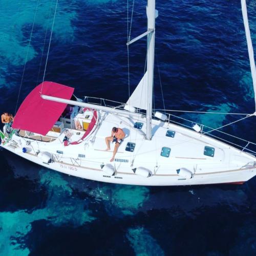 Sailboat in the sea of the La Maddalena Archipelago