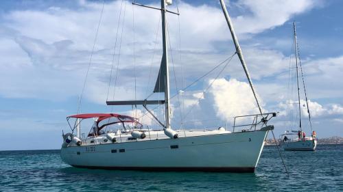 Sailboat in the sea of the La Maddalena Archipelago