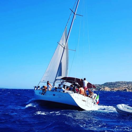 Passengers on board a sailing boat