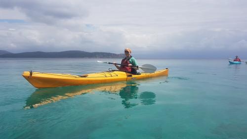 Kayak hiker in the sea of Alghero