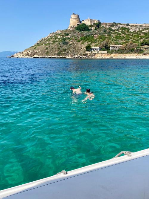 Snorkeling in the clear water of the Gulf of Cagliari