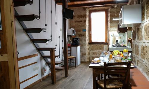 <p>Breakfast in a bed and breakfast in the center of Alghero</p><p><br></p>