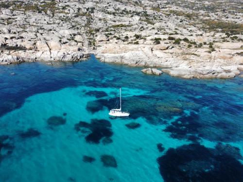 <p>Sailing boat in the Gulf of Asinara in the crystal clear sea for snorkeling</p><p><br></p>