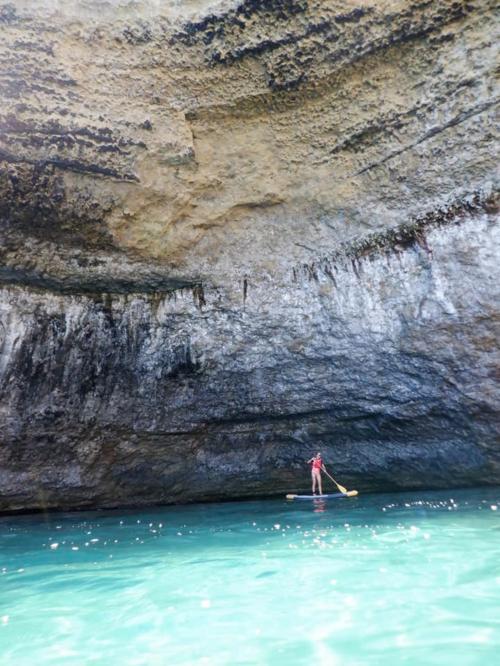 SUP girl in a cave in Balai bay
