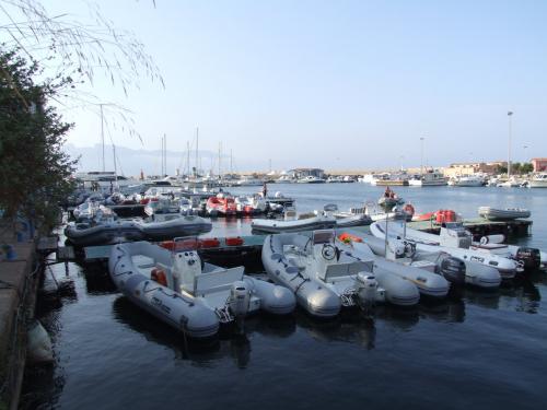 Rubber boats in the port of Arbatax