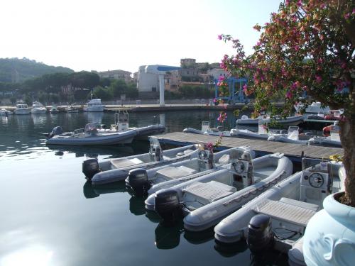 Rubber boats in the port of Arbatax