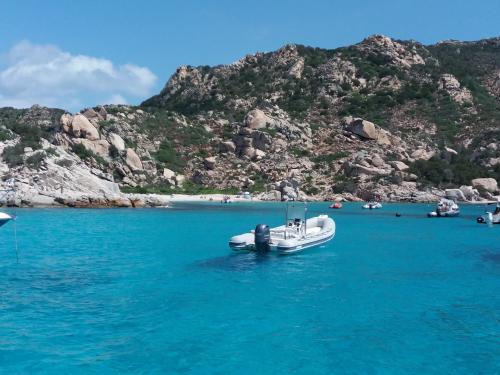 Dinghy in the sea of the Costa Smeralda